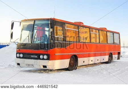 Novyy Urengoy, Russia - March 16, 2014: Old Red Intercity Coach Bus Ikarus 250 In A City Street.