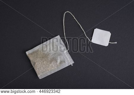 Hearbal Tea Bag On A Black Background
