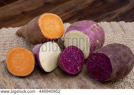 Colorful Root Vegetables Pink, Purple And Orange Organic Sweet Potatos