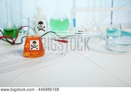 Poison Fluids In Toxicology Laboratory Of Chemical Producer. Photo Contains Toxicology Report, Test 