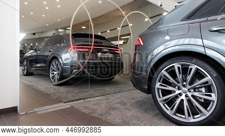 Minsk, Belarus - Dec 20, 2021: New Car Suv Audi Q8 In A Dealer Showroom With Reflection In The Mirro