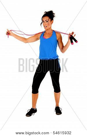 Woman With Jump Rope And Workout Clothes Looking At Camera