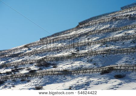 Snowy Slope With Protection From Avalanches