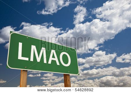 LMAO, Texting Abbreviation for Laughing My Ass Off, Green Road Sign with Dramatic Sky and Clouds.
