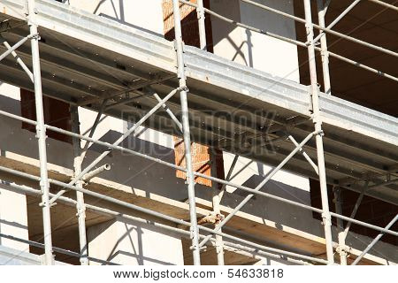 Scaffold Building For The Construction Of Buildings In The Immense Construction Site