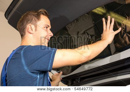 Mechanic Tinting Car Window With Tinted Foil Or Film