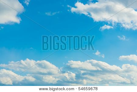 Cottony Cloud And Blue Sky On A Sunny Day