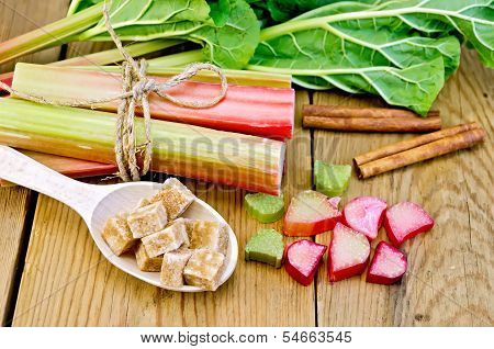 Rhubarb With Sugar And Cinnamon On The Board