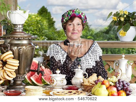 Woman Drinking Tea Outdoors