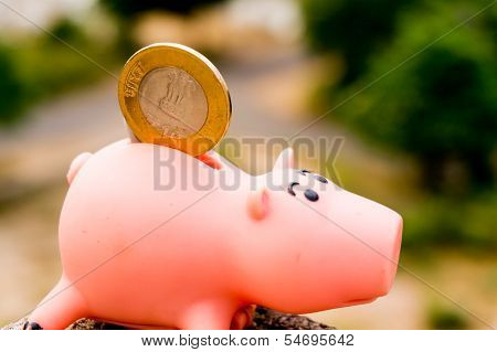 10 Rupee Coin In Piggy Bank