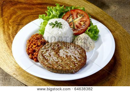 hamburger meat with rice and salad