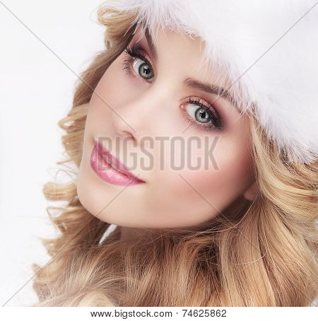 Cute Young Woman In Furry White Cap