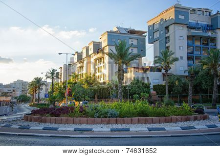 City Roundabout In Warm Light Of Sunset