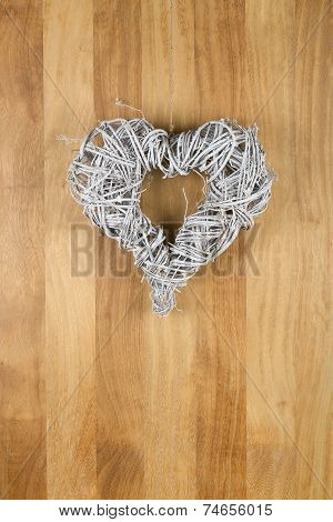 Heart Shape Christmas Door White Wreath On Sapele Wood Background