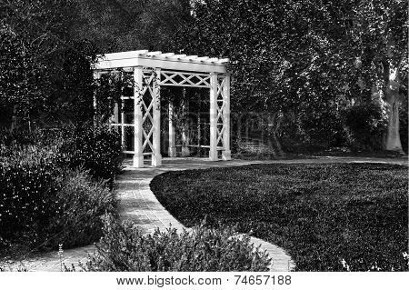 Garden Trellis And Path In Black And White