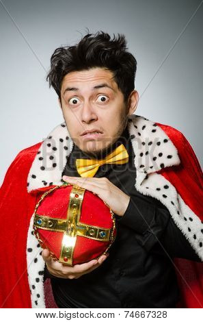 Concept with funny man wearing crown