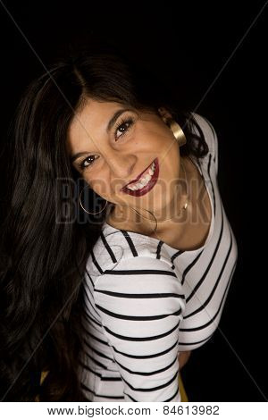 Portriat Of A Beautiful Dark Complected Female Model Wearing Striped Blouse