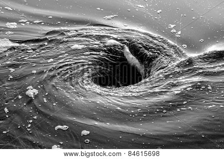 Swirling pool of water