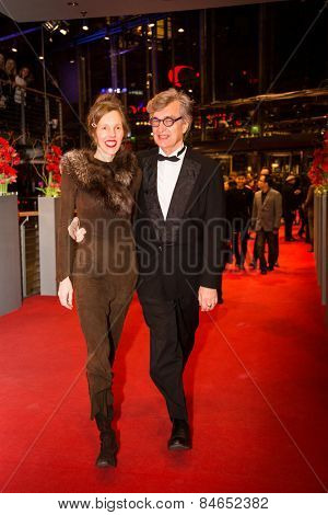 BERLIN, GERMANY - FEBRUARY 14: Wim Wenders with wife Donata Wenders . Closing Ceremony of the 65th Berlinale International Film Festival at Berlinale Palace on February 14, 2015 in Berlin, Germany.