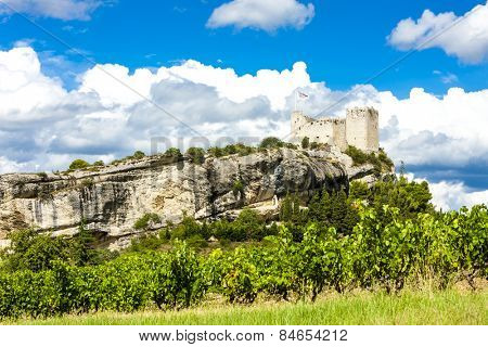 ruins of castle in Vaison-la-Romaine with vineyard, Provence, France