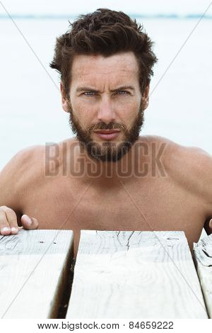 Portrait Of Confident Athletic Man With No Shirt