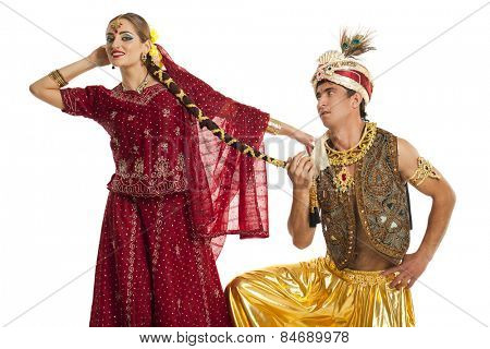 Indian couple. Portrait of beautiful Indian family in traditional costume standing isolated on white background. Indian husband and wife model.
