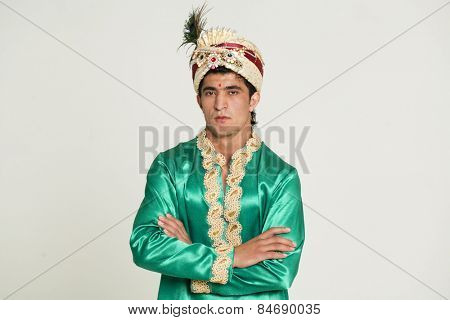 Young indian male in dhoti dress, isolated on white background
