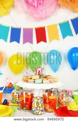 Prepared birthday table with sweets for children party