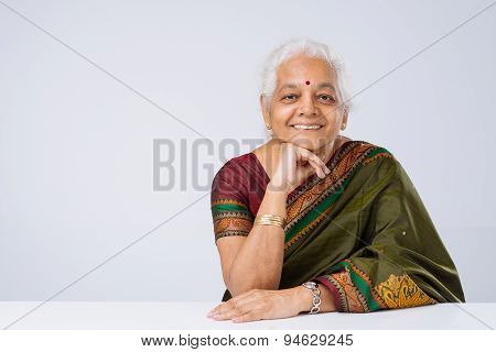 Senior Woman In Traditional Clothes