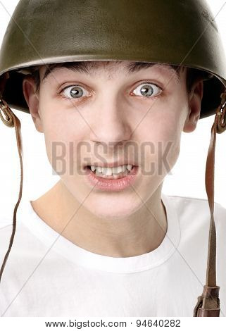 Teenager In A Military Helmet