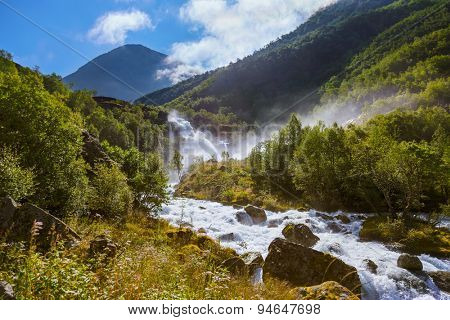 Waterfall near Briksdal glacier - Norway - nature and travel background