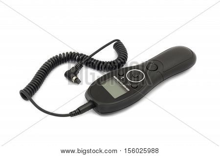 Remote control shutter switch for DSLR and mirrorless camera on white background
