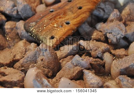 Afelia. Cypriot national dish of marinated and stewed pork in aromatic spices.
