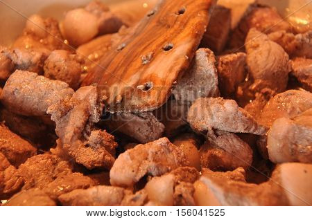 Afelia. Cypriot national dish of marinated and stewed pork in aromatic spices.
