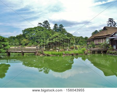 Genkyuen Garden in Hikone, Shiga Prefecture, Japan. Genkyuen Garden is a Japanese garden with a central pond and a circular walking trail. It was built on the grounds of Hikone Castle in 1677.