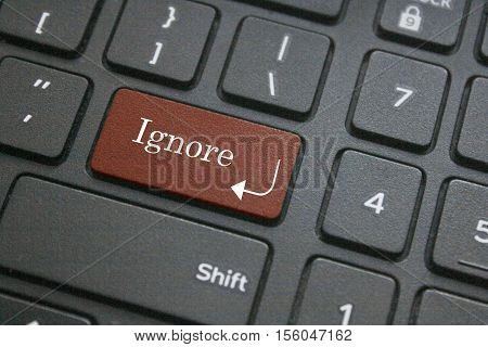 Close up of ignore button on computer keyboard