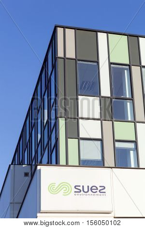 Lyon, France - October 22, 2016: Suez Environnement is a French-based utility company which operates largely in the water treatment and waste management sectors