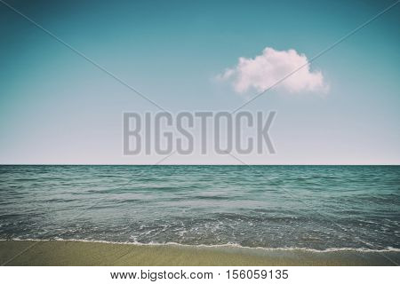turquoise sea and blue sky landscape, toned like instagram filter