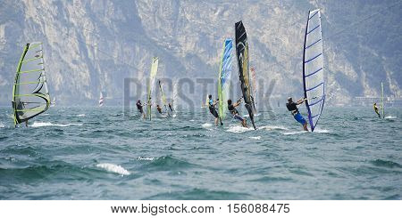 Torbole - Nago, Lago di Garda (Lago Benaco), Italy - August 11, 2015: A windsurfing on Lake Garda in Torbole resort.