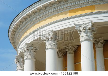 White columns on the facade of architectural buildings.