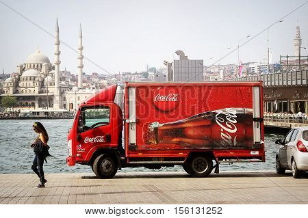 Turkey Istanbul embankment - June 2016: Truck Coca-Cola on the background strinam architecture.