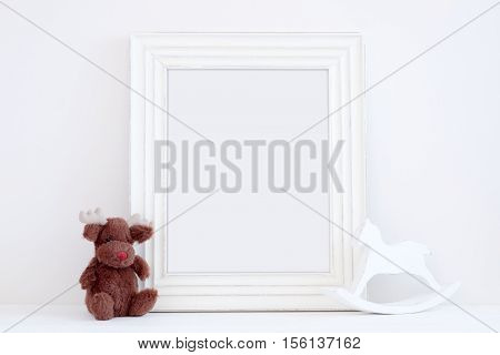 Christmas styled mockup portrait frame toy reindeer and rocking horse overlay your business message promotion headline or design great for lifestyle bloggers and social media campaigns