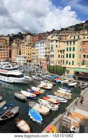 CAMOGLI, ITALY - AUGUST 27, 2013: Fishing village of Camogli on August 27, 2013 in Camogli, Italy. It is one of the most popular resorts in Genova region and is highly crowded during summer.
