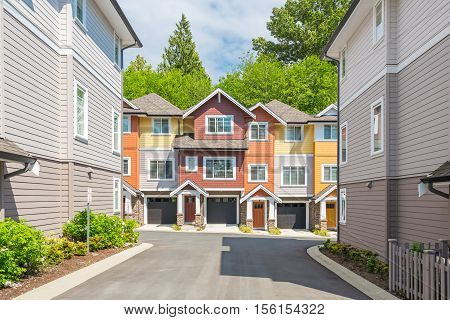 Row of townhouses on a sunny day