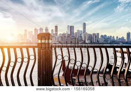 andscape of downtown near water of chongqing in blue sky