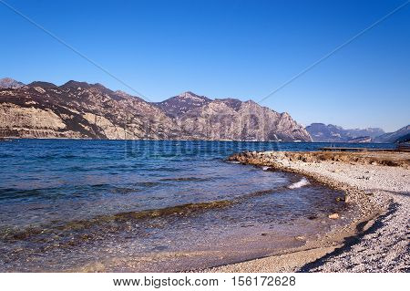 The Garda Lake in winter (Lago di Garda) with mountains near Malcesine Veneto Trentino Lombardia Italy Europe