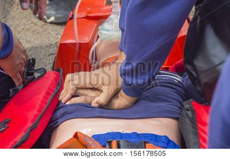 cpr dummy victim drowning on oxygen cylinder mank with bag