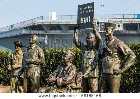 SAN DIEGO, CALIFORNIA - FEBRUARY 29, 2016: Bronze statues of US military personnel in artwork entitled, 