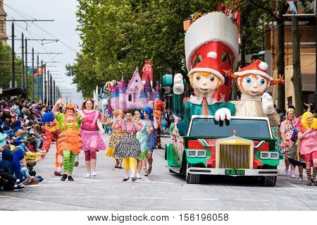 Adelaide South Australia - November 12 2016: More than 250.000 came to the city centre to see 172 colourful sets of floats bands dancers clowns and Father Christmas. The Credit Union Christmas Pageant is one of the biggest events in South Australia