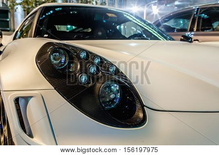 ABU DHABI - NOVEMBER 3 2016: Alfa Romeo 4C Coupe in Abu Dhabi. Detail of a 4C front light